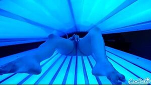 teen latina college student gives  lesbian pussy a massage in tanning bed